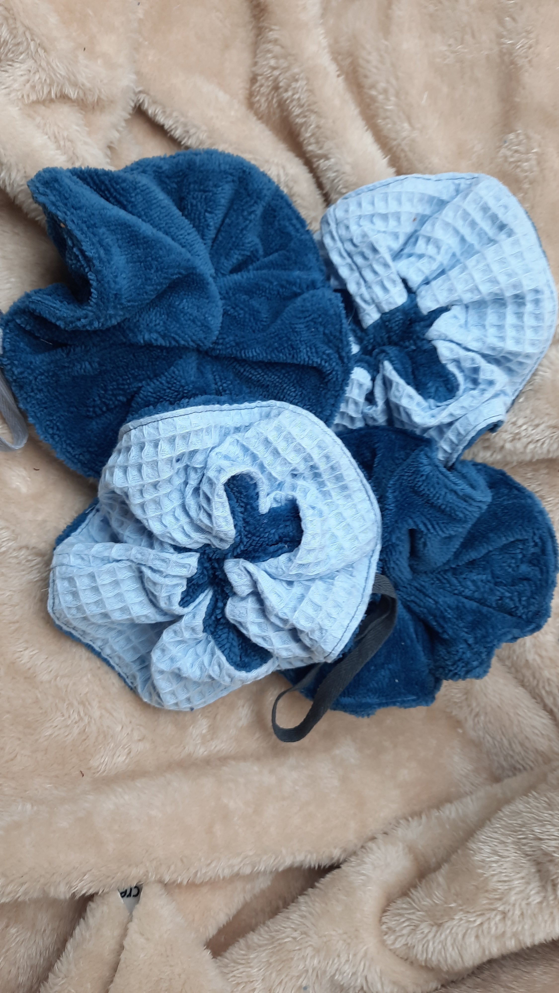 Fleur de douche bi-matière